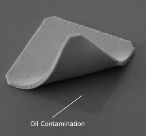 Silicone Pad Oil Contamination
